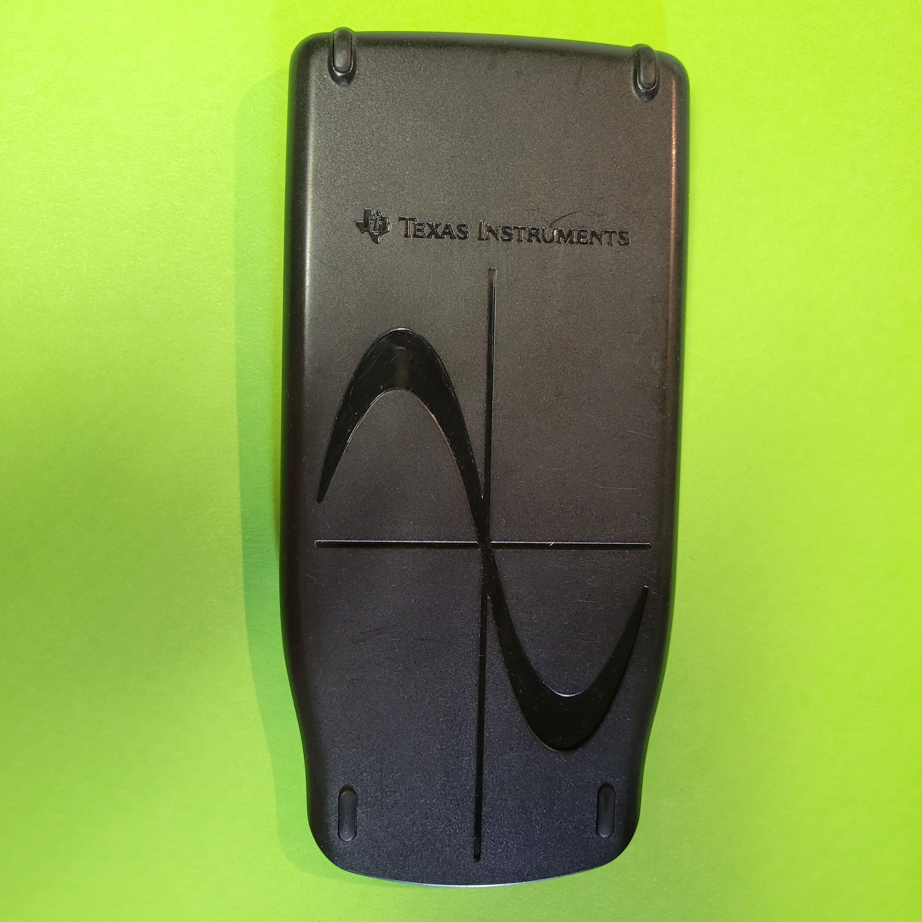 An image of the case of a texas instruments ti83 plus graphing calculator